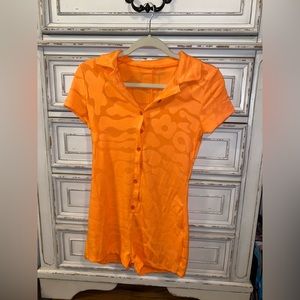 Fernvia orange button down jumpsuit with floral design in size XS